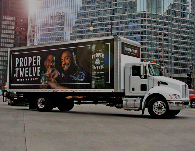 Proper Twelve Advertising Truck Image
